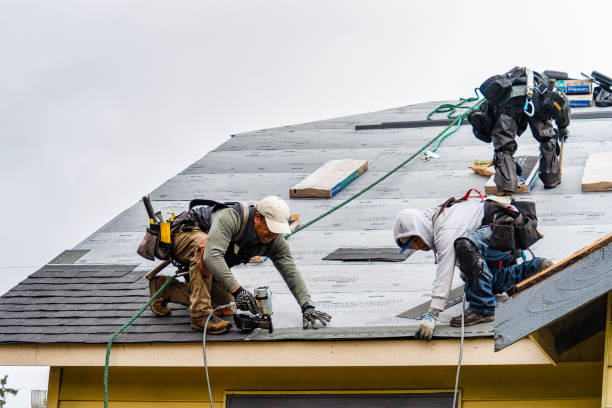 Professional Roofing technician working in Strausstown, PA